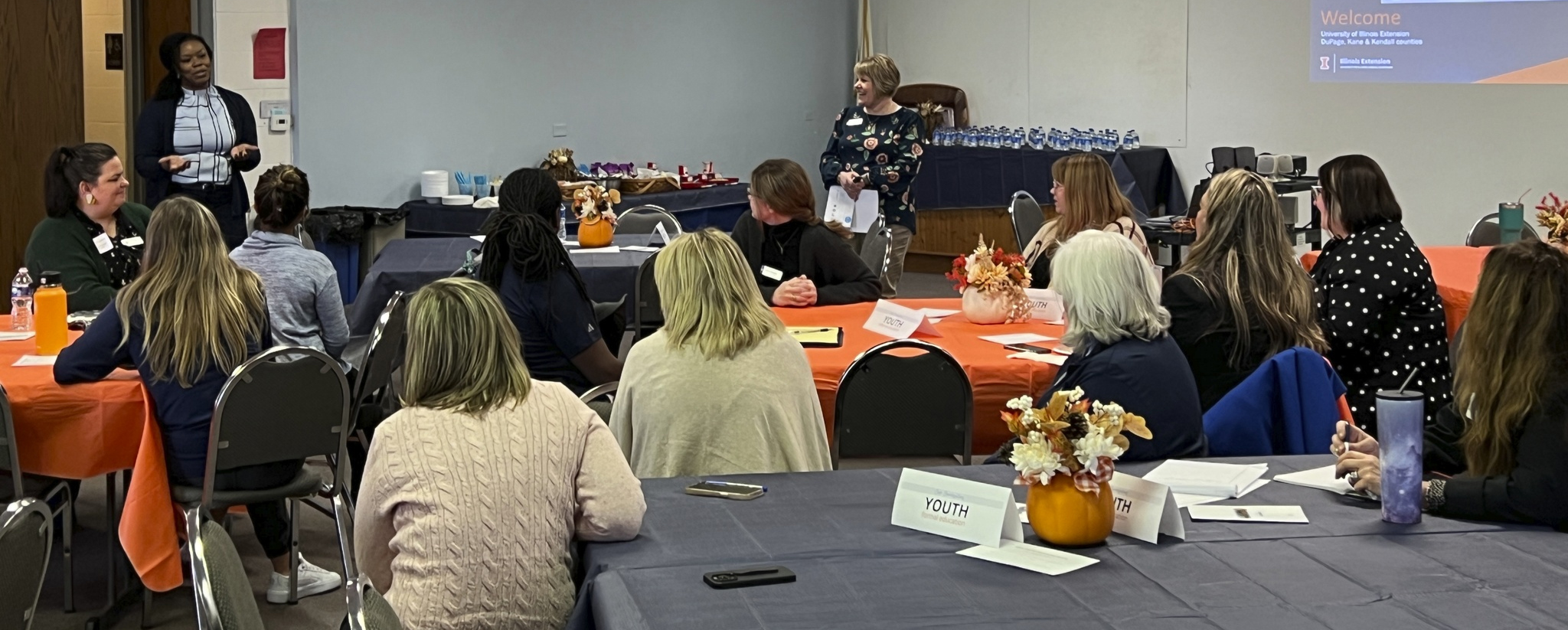 A group of people attending a workshop event.
